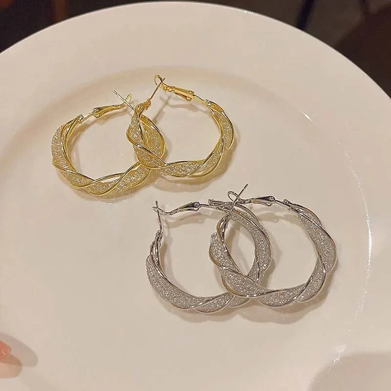Hoop Earrings with Twisted Design - Image 3